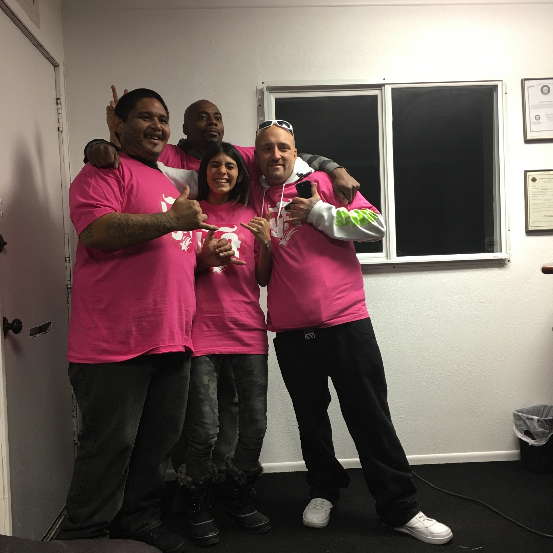 Team Rideshare USA crew in matching pink Lyft shirts
