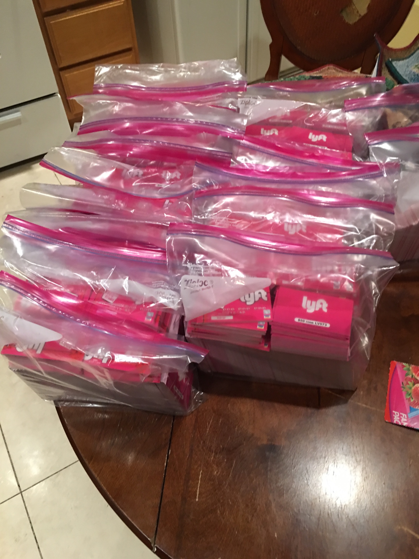 Bags of Lyft promo card kits prepared for street team distribution